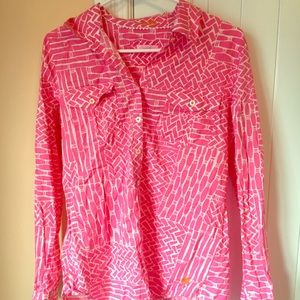 Bright pink light weight button up shirt.